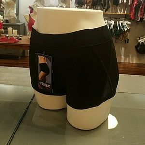 Microfiber short with perforated microfiber insert